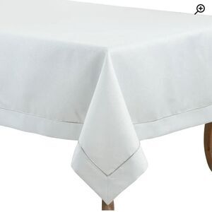 Saro Bourget white tablecloths 65" x 90".  Silver piping Beautiful/great quality